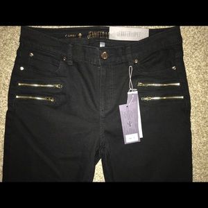 Jennifer Lopez black jean capris